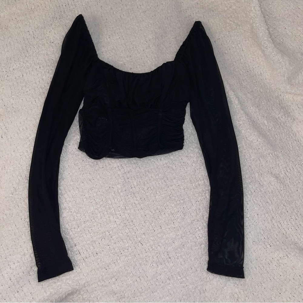 Black long sleeved crop top. All mesh except for boob part!